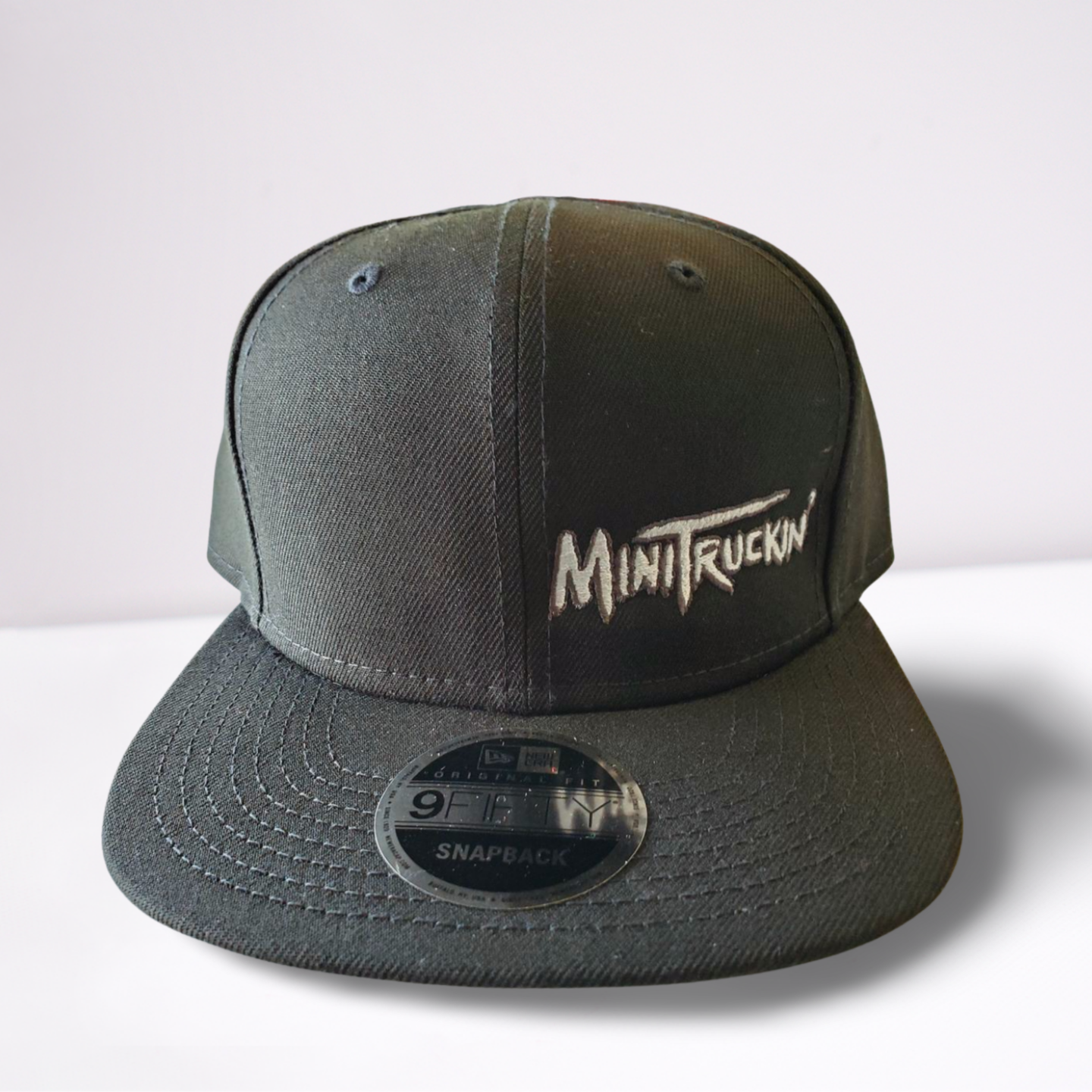 Snapback Cap - Mini Truckin'- Black Hat with White Logo